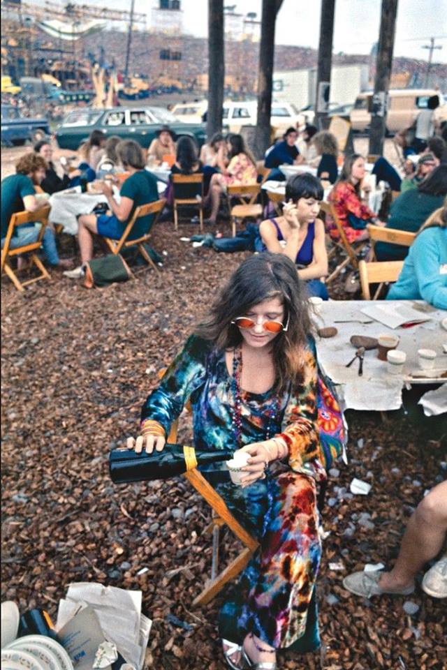 August 15-17 1969 Janis Joplin sipping Veuve at Woodstock.jpg