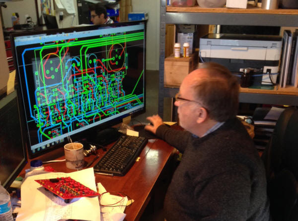 Bill Creating Another Circuit Board Design Masterpiece.jpg